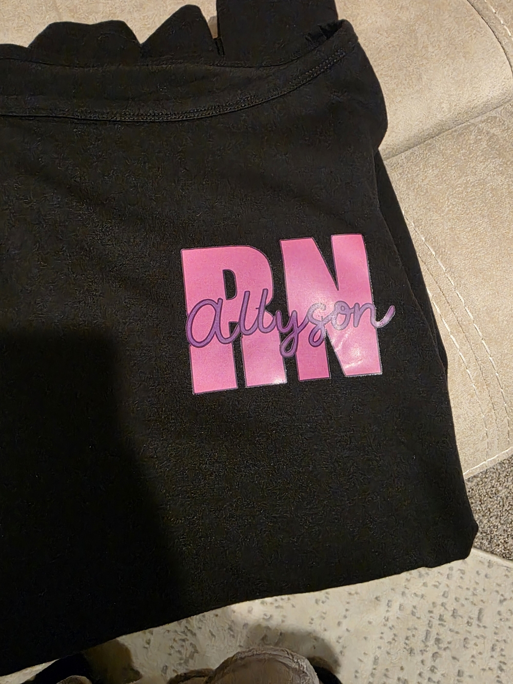 Black T-shirt with Pink RN Graphic